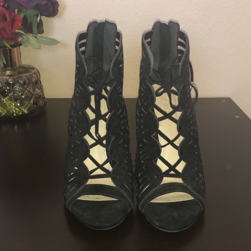 Black lace-up heels.